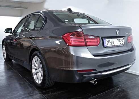 Brun metallic BMW 320D sedan stulen/ rån i Alby, Stockholm